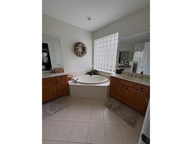 This exceptionally clean home features a newer 2023 heated on The Legacy Golf and Tennis Club in Florida - for sale on GolfHomes.com, golf home, golf lot