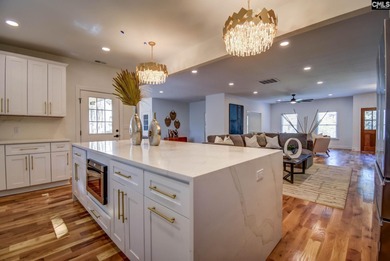 All-Brick Beauty on the 11th Hole in a Gated Golf on Golden Hills Golf and Country Club in South Carolina - for sale on GolfHomes.com, golf home, golf lot