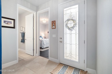 Perfectly sized and beautifully maintained, this just-under-1800 on Plantation Bay Golf and Country Club in Florida - for sale on GolfHomes.com, golf home, golf lot