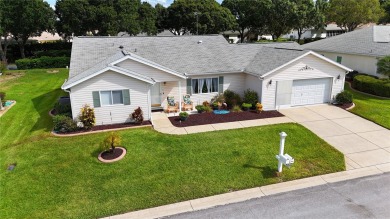 Honey, stop the car!  Great curb appeal on this 2/2/2 on Eagle Ridge At Spruce Creek Country Club in Florida - for sale on GolfHomes.com, golf home, golf lot