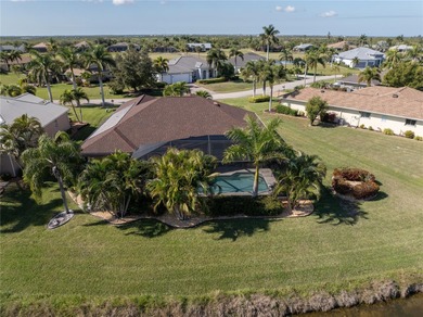 Welcome to this beautifully maintained 3-bedroom, plus a den on Royal Tee Country Club in Florida - for sale on GolfHomes.com, golf home, golf lot