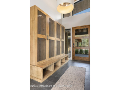 Experience mountain modern luxury in this stunning one-level, 4 on Snake River Sporting Club in Wyoming - for sale on GolfHomes.com, golf home, golf lot