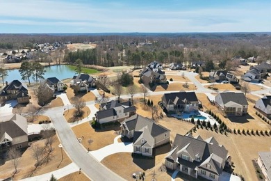 Simple luxury at its finest! Discover this rare ranch plan on Traditions of Braselton Golf Club in Georgia - for sale on GolfHomes.com, golf home, golf lot