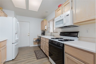 Welcome home to this cozy 2-bedroom, 2-bath townhome nestled in on Highland Falls Golf Club in Nevada - for sale on GolfHomes.com, golf home, golf lot