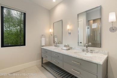 Experience mountain modern luxury in this stunning one-level, 4 on Snake River Sporting Club in Wyoming - for sale on GolfHomes.com, golf home, golf lot