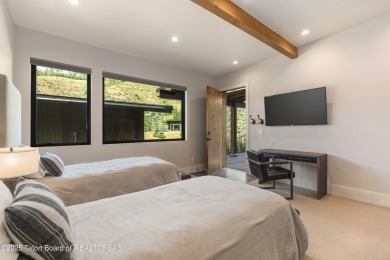 Experience mountain modern luxury in this stunning one-level, 4 on Snake River Sporting Club in Wyoming - for sale on GolfHomes.com, golf home, golf lot