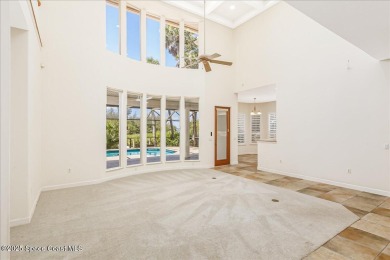 NEW PRICE! Stunning riverfront estate-style pool home in the on Aquarina Beach and Country Club in Florida - for sale on GolfHomes.com, golf home, golf lot