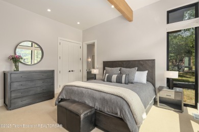 Experience mountain modern luxury in this stunning one-level, 4 on Snake River Sporting Club in Wyoming - for sale on GolfHomes.com, golf home, golf lot