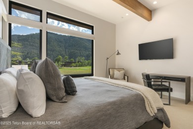 Experience mountain modern luxury in this stunning one-level, 4 on Snake River Sporting Club in Wyoming - for sale on GolfHomes.com, golf home, golf lot