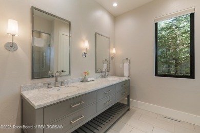 Experience mountain modern luxury in this stunning one-level, 4 on Snake River Sporting Club in Wyoming - for sale on GolfHomes.com, golf home, golf lot