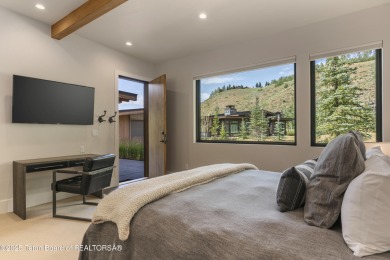 Experience mountain modern luxury in this stunning one-level, 4 on Snake River Sporting Club in Wyoming - for sale on GolfHomes.com, golf home, golf lot