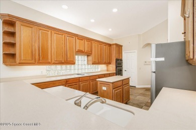 NEW PRICE! Stunning riverfront estate-style pool home in the on Aquarina Beach and Country Club in Florida - for sale on GolfHomes.com, golf home, golf lot