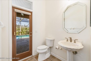 NEW PRICE! Stunning riverfront estate-style pool home in the on Aquarina Beach and Country Club in Florida - for sale on GolfHomes.com, golf home, golf lot