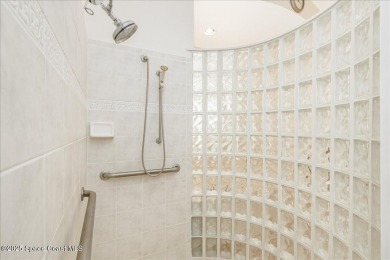 NEW PRICE! Stunning riverfront estate-style pool home in the on Aquarina Beach and Country Club in Florida - for sale on GolfHomes.com, golf home, golf lot