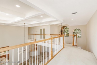 NEW PRICE! Stunning riverfront estate-style pool home in the on Aquarina Beach and Country Club in Florida - for sale on GolfHomes.com, golf home, golf lot