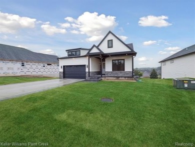 THIS HOME IS BUILT AS SHOWN IN PICS (sans the flooring) and on Metamora Country Club in Michigan - for sale on GolfHomes.com, golf home, golf lot