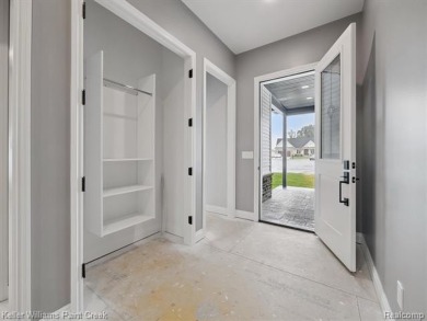 THIS HOME IS BUILT AS SHOWN IN PICS (sans the flooring) and on Metamora Country Club in Michigan - for sale on GolfHomes.com, golf home, golf lot