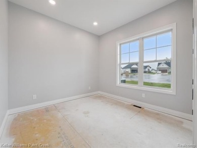 THIS HOME IS BUILT AS SHOWN IN PICS (sans the flooring) and on Metamora Country Club in Michigan - for sale on GolfHomes.com, golf home, golf lot