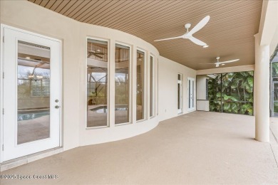 NEW PRICE! Stunning riverfront estate-style pool home in the on Aquarina Beach and Country Club in Florida - for sale on GolfHomes.com, golf home, golf lot