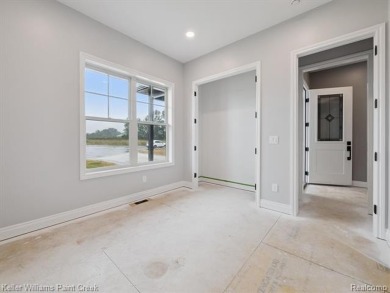 THIS HOME IS BUILT AS SHOWN IN PICS (sans the flooring) and on Metamora Country Club in Michigan - for sale on GolfHomes.com, golf home, golf lot
