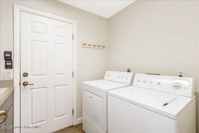 NEW PRICE! Stunning riverfront estate-style pool home in the on Aquarina Beach and Country Club in Florida - for sale on GolfHomes.com, golf home, golf lot