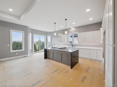 THIS HOME IS BUILT AS SHOWN IN PICS (sans the flooring) and on Metamora Country Club in Michigan - for sale on GolfHomes.com, golf home, golf lot