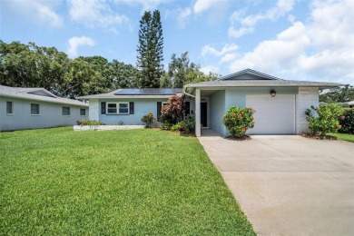 Welcome to this beautifully updated 2-bedroom, 1.5-bath home on Highland Lakes Executive Golf Course in Florida - for sale on GolfHomes.com, golf home, golf lot