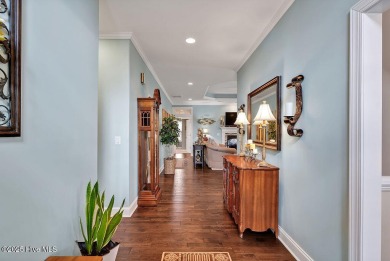 Curb appeal, low maintenance, attention to detail, and a high on Cape Fear National At Brunswick Forest in North Carolina - for sale on GolfHomes.com, golf home, golf lot