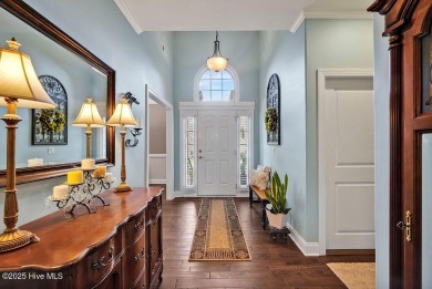 Curb appeal, low maintenance, attention to detail, and a high on Cape Fear National At Brunswick Forest in North Carolina - for sale on GolfHomes.com, golf home, golf lot