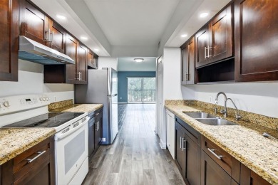 Beautifully Renovated, Spacious 2-Bed/2-Bath, Garden/pool area on Flamingo Lakes Country Club in Florida - for sale on GolfHomes.com, golf home, golf lot