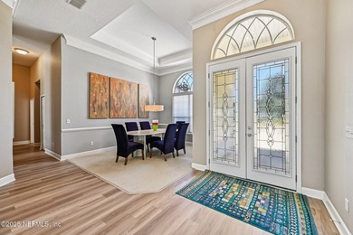 Welcome home to this expansive Cimarrone corner residence on a on Cimarrone Golf and Country Club in Florida - for sale on GolfHomes.com, golf home, golf lot