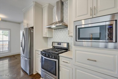 Looking for a a beautiful open plan 3/2 home with great curb on Castlewoods Golf Club in Mississippi - for sale on GolfHomes.com, golf home, golf lot