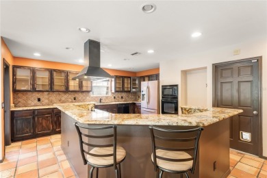 THIS MEDITERRANEAN POOL HOME HAS IT ALL - LOCATION, LUXURY on Feather Sound Country Club in Florida - for sale on GolfHomes.com, golf home, golf lot