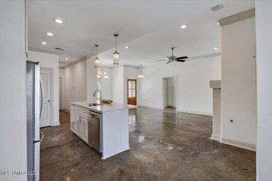 Looking for a a beautiful open plan 3/2 home with great curb on Castlewoods Golf Club in Mississippi - for sale on GolfHomes.com, golf home, golf lot