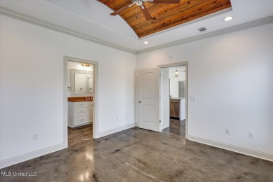 Looking for a a beautiful open plan 3/2 home with great curb on Castlewoods Golf Club in Mississippi - for sale on GolfHomes.com, golf home, golf lot