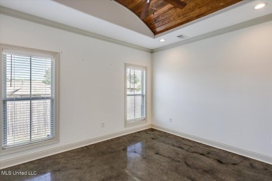 Looking for a a beautiful open plan 3/2 home with great curb on Castlewoods Golf Club in Mississippi - for sale on GolfHomes.com, golf home, golf lot