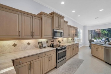 This stunning Arthur Rutenberg SF home that epitomizes luxury on Pelican Marsh Golf Club in Florida - for sale on GolfHomes.com, golf home, golf lot