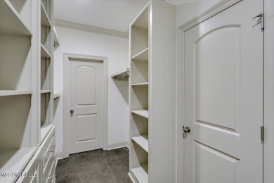Looking for a a beautiful open plan 3/2 home with great curb on Castlewoods Golf Club in Mississippi - for sale on GolfHomes.com, golf home, golf lot
