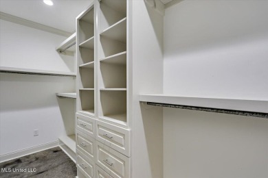 Looking for a a beautiful open plan 3/2 home with great curb on Castlewoods Golf Club in Mississippi - for sale on GolfHomes.com, golf home, golf lot