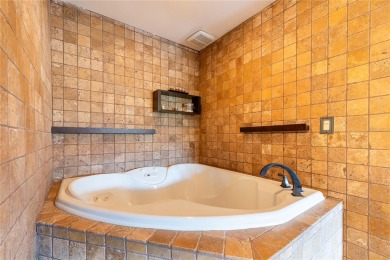 THIS MEDITERRANEAN POOL HOME HAS IT ALL - LOCATION, LUXURY on Feather Sound Country Club in Florida - for sale on GolfHomes.com, golf home, golf lot