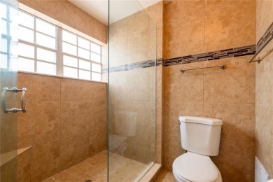 THIS MEDITERRANEAN POOL HOME HAS IT ALL - LOCATION, LUXURY on Feather Sound Country Club in Florida - for sale on GolfHomes.com, golf home, golf lot