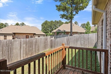 Looking for a a beautiful open plan 3/2 home with great curb on Castlewoods Golf Club in Mississippi - for sale on GolfHomes.com, golf home, golf lot