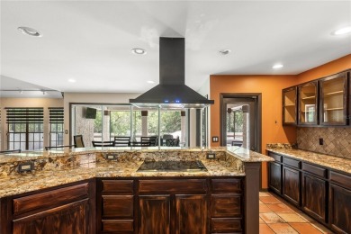 THIS MEDITERRANEAN POOL HOME HAS IT ALL - LOCATION, LUXURY on Feather Sound Country Club in Florida - for sale on GolfHomes.com, golf home, golf lot