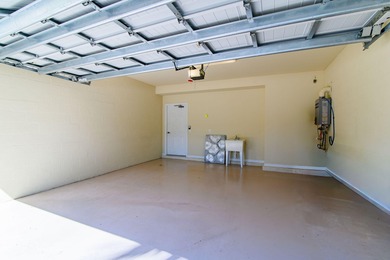 In the Village of Sonoma, enjoy a first-floor end-unit coach on The Rookery At Marco in Florida - for sale on GolfHomes.com, golf home, golf lot