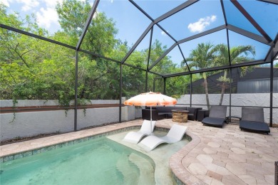 THIS MEDITERRANEAN POOL HOME HAS IT ALL - LOCATION, LUXURY on Feather Sound Country Club in Florida - for sale on GolfHomes.com, golf home, golf lot