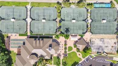 This stunning Arthur Rutenberg SF home that epitomizes luxury on Pelican Marsh Golf Club in Florida - for sale on GolfHomes.com, golf home, golf lot