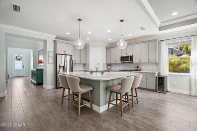 Enjoy care-free paradise living in this RARE & NEWER CABANA BAY on LPGA International Golf Course in Florida - for sale on GolfHomes.com, golf home, golf lot