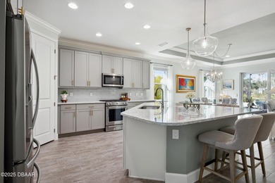 Enjoy care-free paradise living in this RARE & NEWER CABANA BAY on LPGA International Golf Course in Florida - for sale on GolfHomes.com, golf home, golf lot