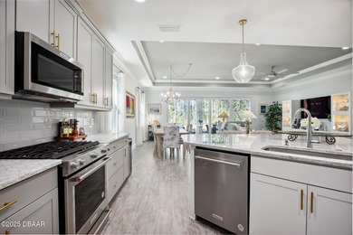 Enjoy care-free paradise living in this RARE & NEWER CABANA BAY on LPGA International Golf Course in Florida - for sale on GolfHomes.com, golf home, golf lot