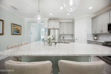 Enjoy care-free paradise living in this RARE & NEWER CABANA BAY on LPGA International Golf Course in Florida - for sale on GolfHomes.com, golf home, golf lot